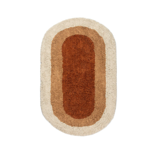 Otis, tæppe i terracotta oval 80x125 cm.